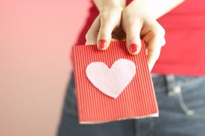 Woman giving a card